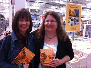 Paula and Yvonne at a Drawn to Sea book signing. Photo by Theda Phoenix.